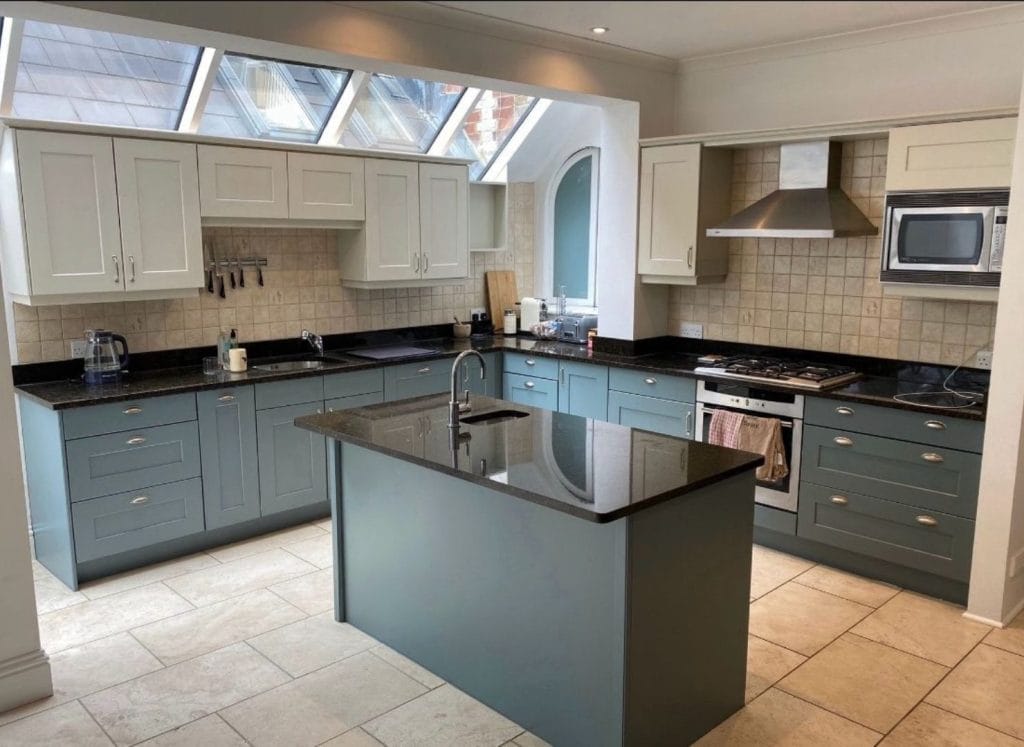 Painted shaker style kitchen cabinets by Page Bespoke Painting Specialists Ltd